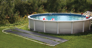 Above ground pool with SunQuest Ground-Mounted Solar Panel